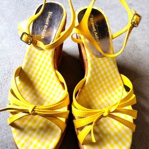 Sandals with compensated heels